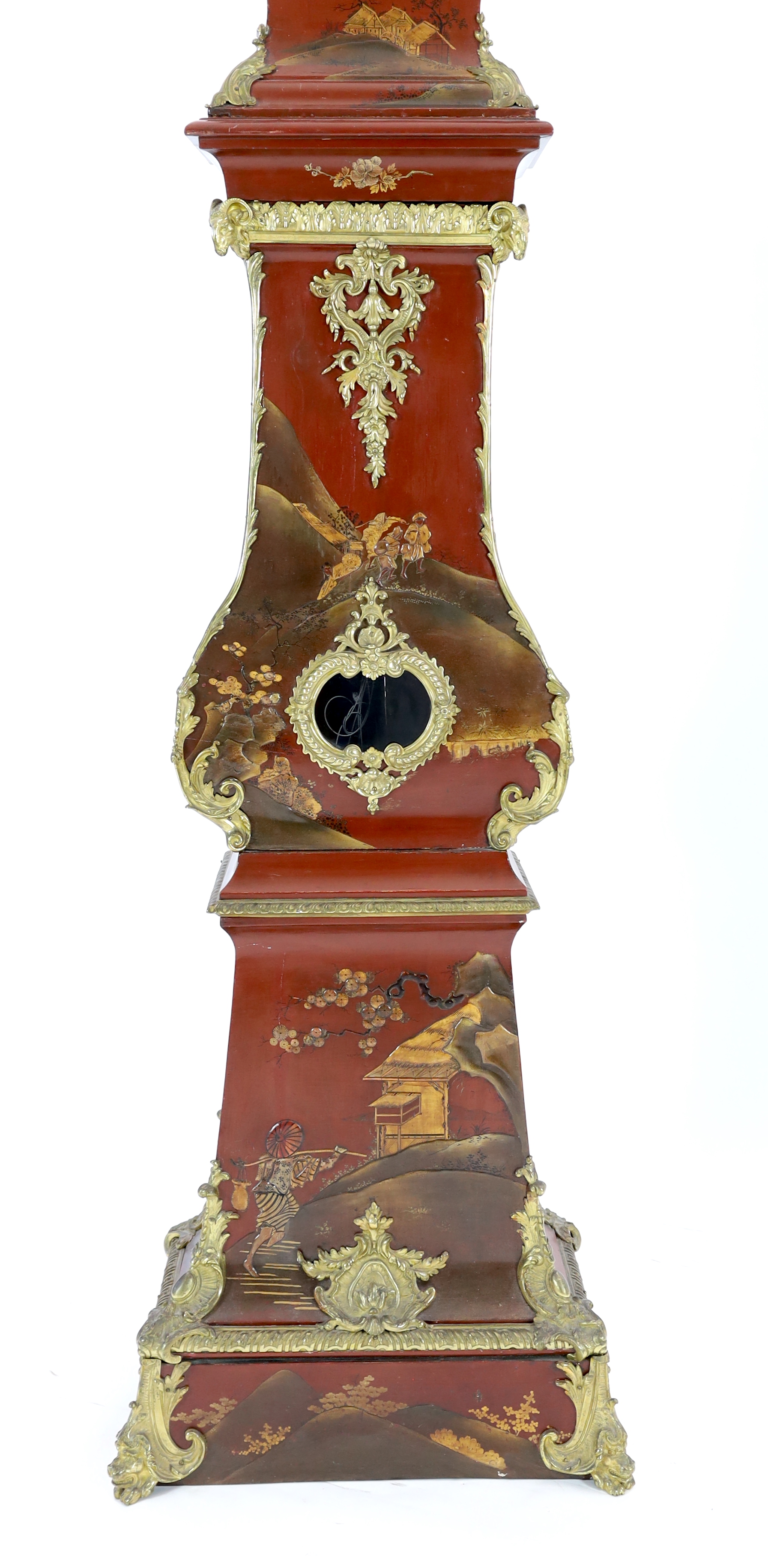 A Louis XV style ormolu mounted red chinoiserie lacquer longcase clock, 46cm wide, 33cm deep, 238cm high, Please note this lot attracts an additional import tax of 5% on the hammer price